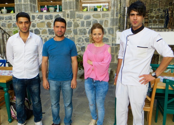 Four members of staff at the Aslihan Antik Pansiyon, Café ve Restorant.
